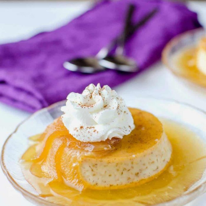 Poached Apple and Cinnamon Creme Caramel (Poached Apple and Cinnamon Flan) - A decadent, creamy dessert. Easy to make, and a perfect make ahead dessert! A delicious twist on the classic Creme Caramel with Americas favourite Apple and Cinnamon
