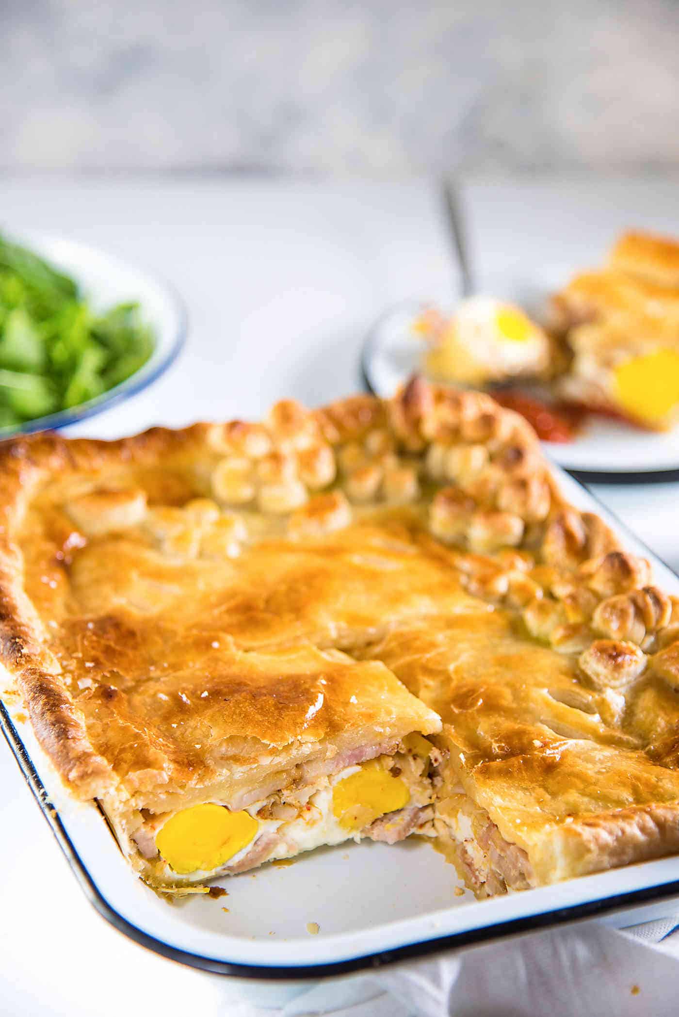 Ultimate Bacon and egg pies (breakfast pies) are a New Zealand classic with smokey bacon and eggs, leeks, cheese and flaky puff pastry! Perfect for breakfast, brunch or even as breakfast for dinner!