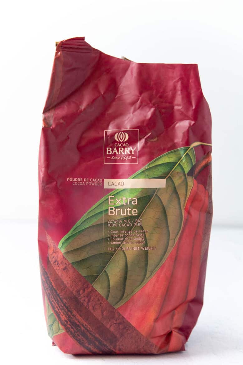 A close up of the dutch process cocoa powder package with the information about the cocoa powder including cocoa fat content.