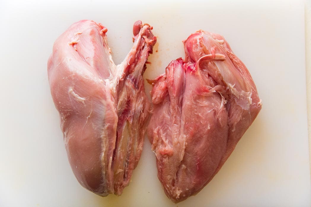 Second step of making a Turkey roulade - A fully filleted breast meat from the breast bone. Repeat with the other turkey breast as well.
